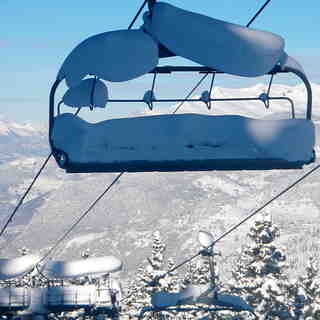 Snow laden chairlift, Méribel
